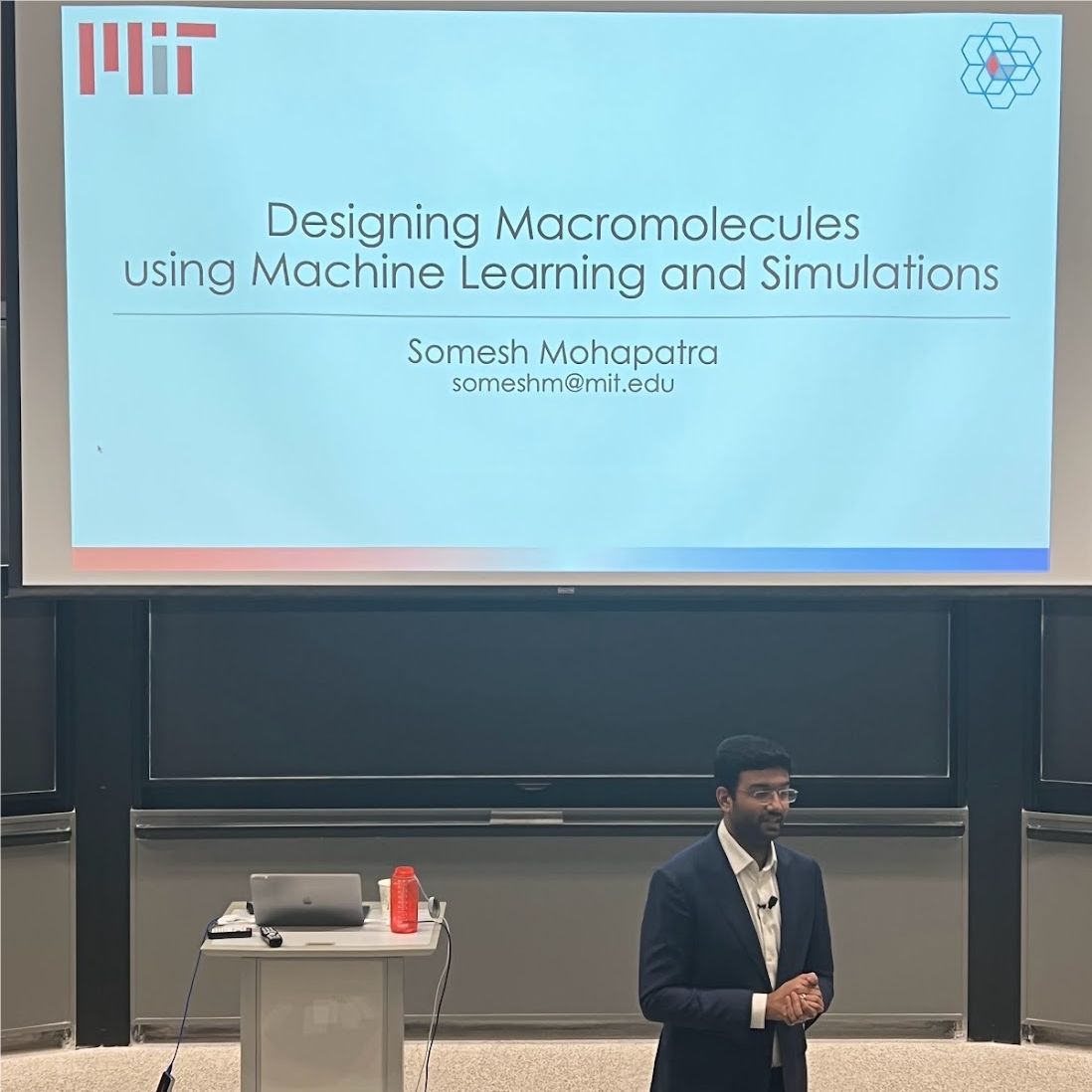 Somesh Mohapatra presenting his PhD thesis defense in an MIT lecture hall